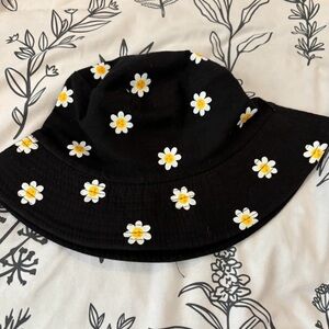 Black Daisy and white rainbow bucket hats